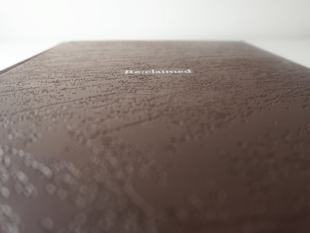 DSC09364 Premium coffee table book printing with debossed cloth cover and white foil title Reclaimed book